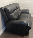 Two seater black leather recliner sofa