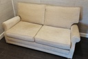 Lovely two seater cream sofa