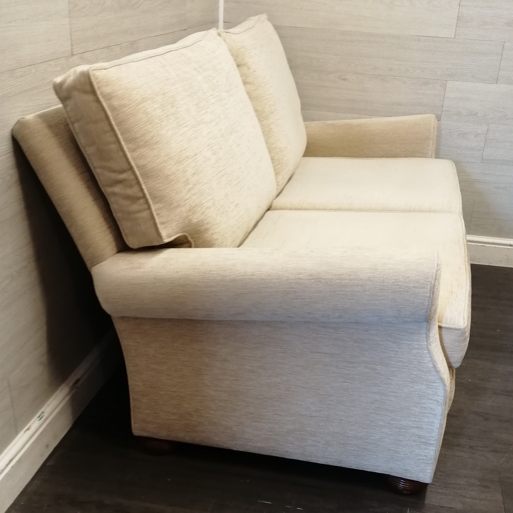 Lovely two seater cream sofa