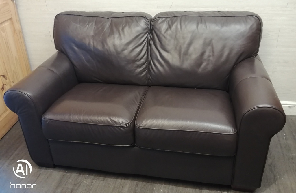 Good quality two seater leather brown sofa