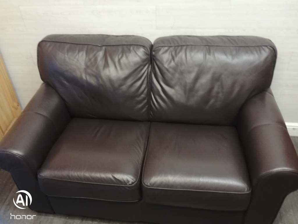 Good quality two seater leather brown sofa