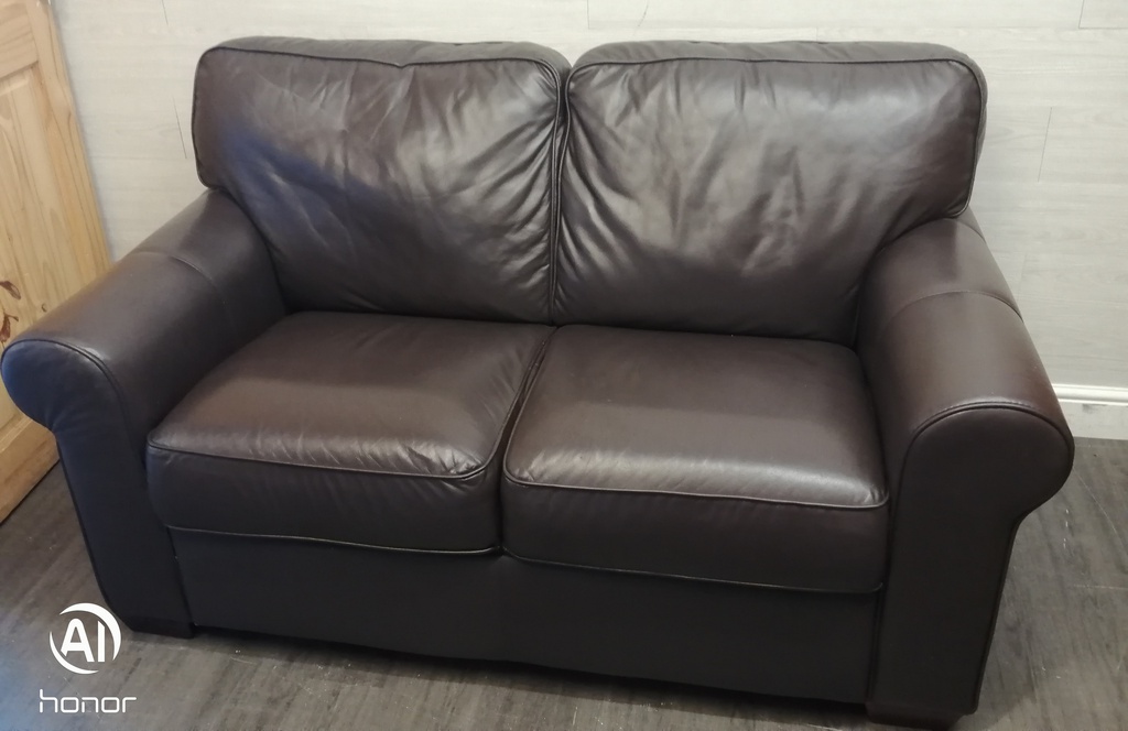 Good quality two seater leather brown sofa