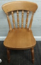 set of four spindle back dining chairs