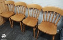 set of four spindle back dining chairs