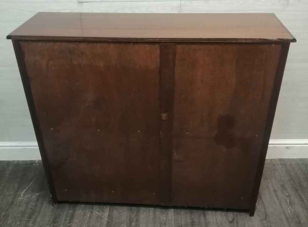 Glazed front sliding door neat bookcase