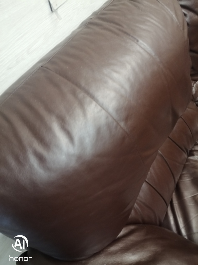 Three seater leather brown sofa