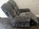 Grey electric recliner armchair
