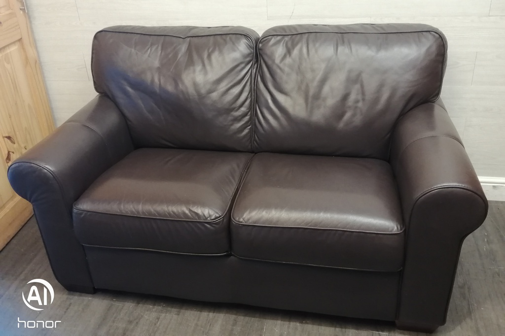 Good quality two seater leather brown sofa