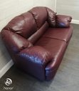 Two seater burgundy leather sofa