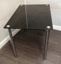 Modern neat black glass dining table