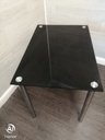 Modern neat black glass dining table