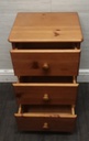 Pine three drawer bedside chest