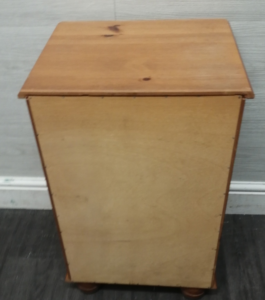 Pine three drawer bedside chest
