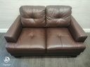 Neat two seater brown leather sofa