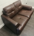 Neat two seater brown leather sofa