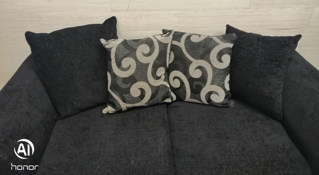 Two seater pillow back sofa