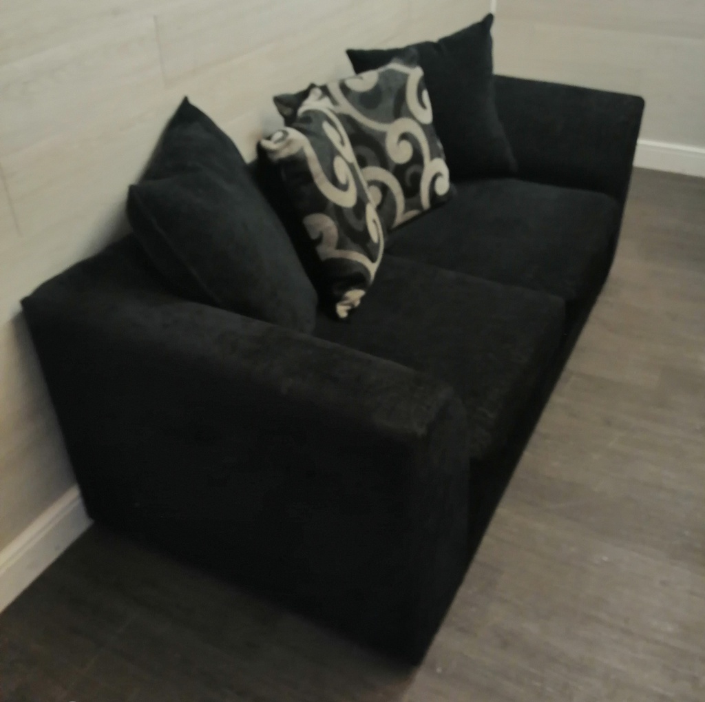 Two seater pillow back sofa