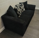 Two seater pillow back sofa