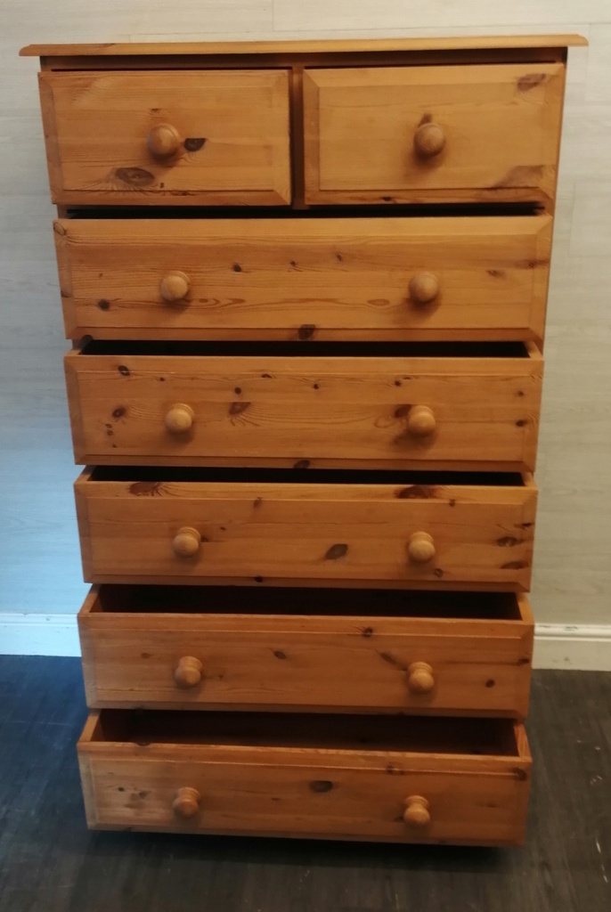 Quality solid pine tall chest of seven drawers