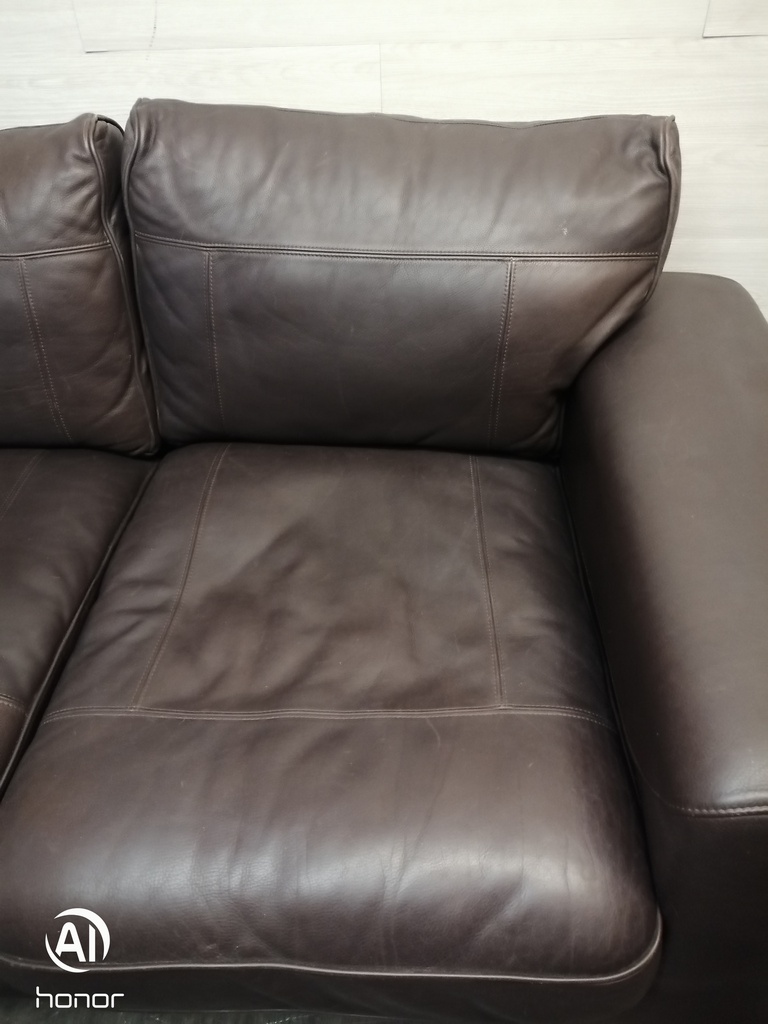 Three seater leather brown sofa
