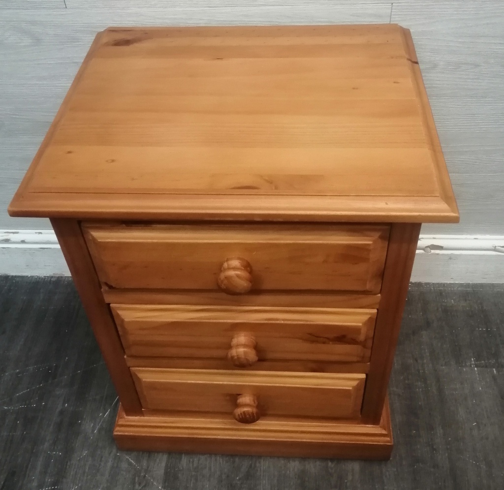 Quality solid pine three drawer bedside chest