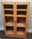 Neat glazed fronted display unit / bookcase