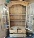 Solid pine glazed  display unit with drawers