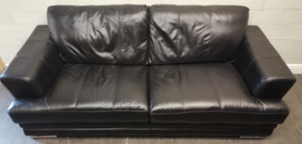 Quality black leather three seater sofa