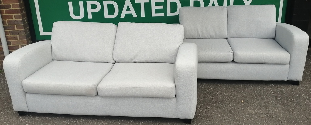 LOVELY DFS GREY 2 SEATER SOFA