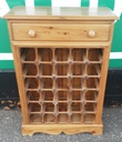 Neat solid pine wine rack