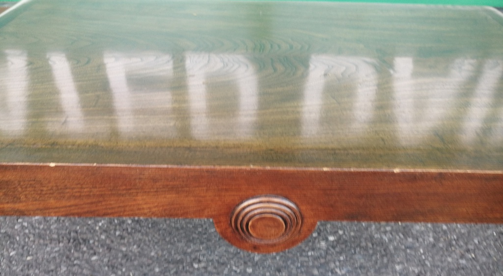Dark wood scrolled coffee table