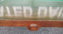 Dark wood scrolled coffee table