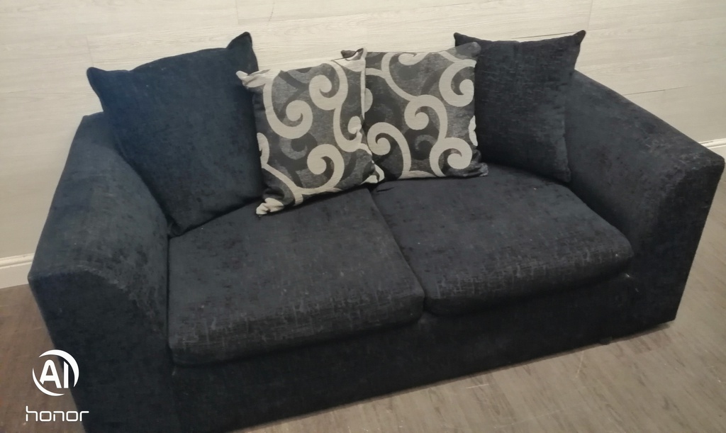 Two seater pillow back sofa