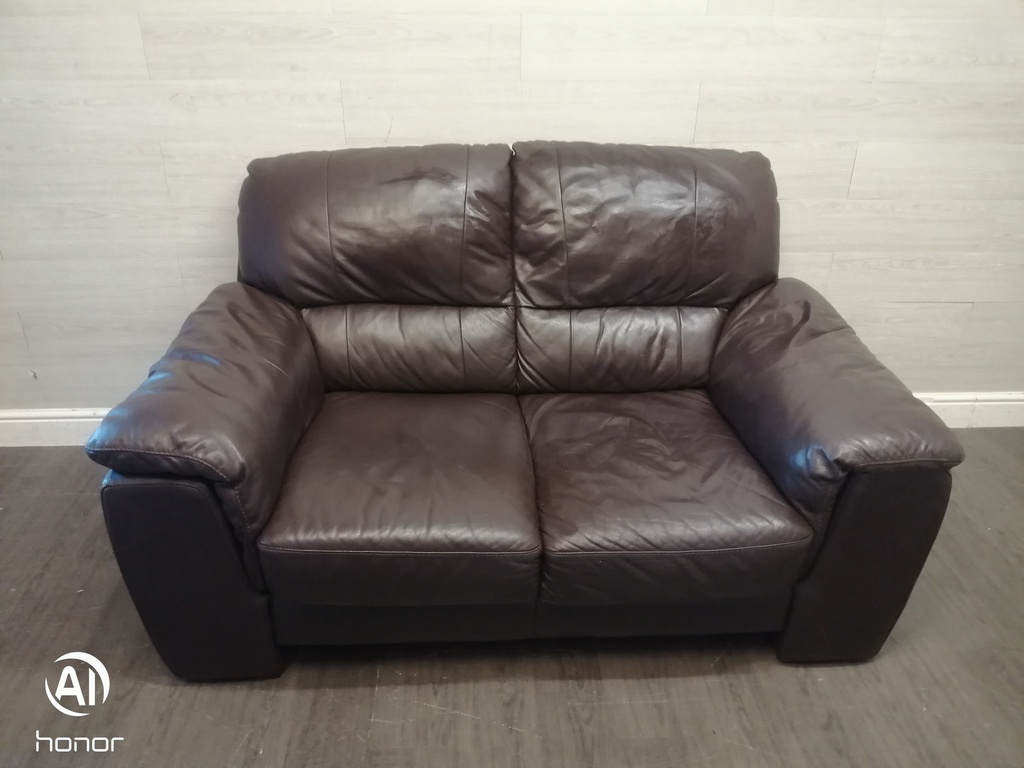 Good quality two seater leather brown sofa