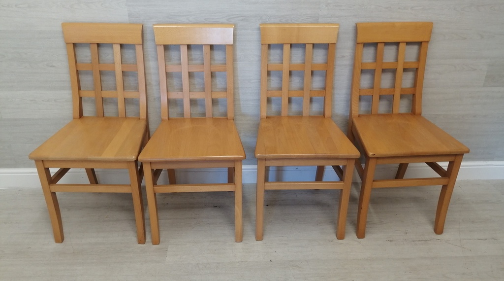 set of four dining chairs