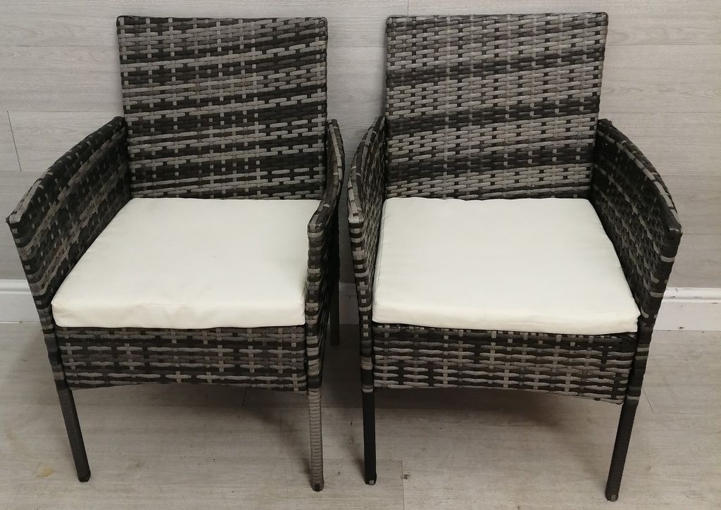 pair of grey toned garden chairs