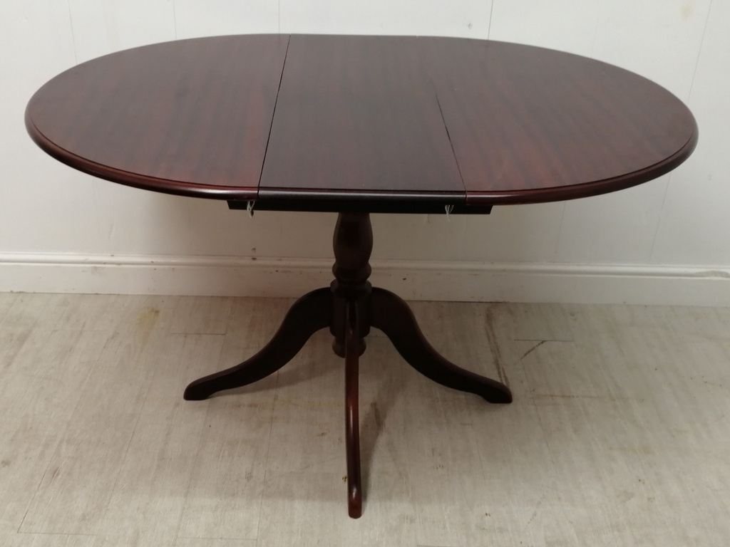 mahogany style extending round table