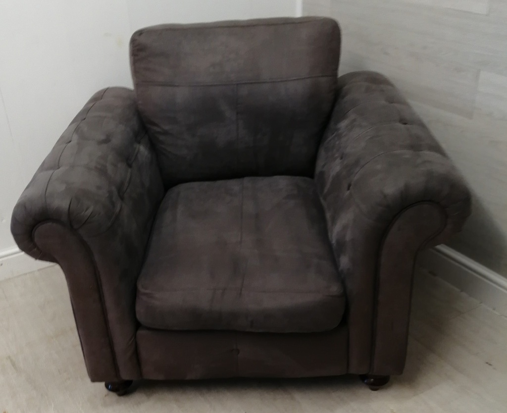 grey single armchair