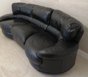 black leather sofa with swivel end seat