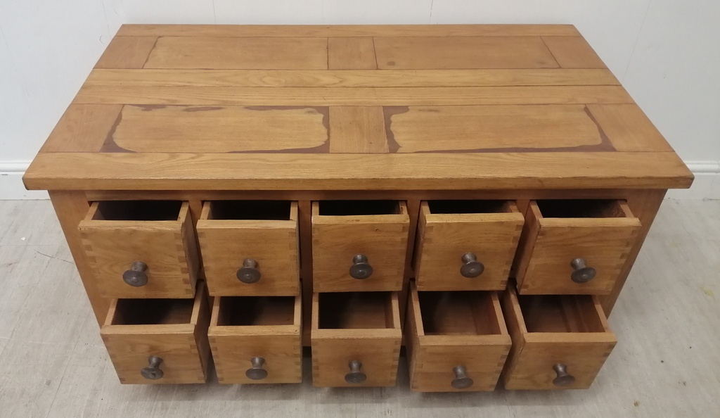 lovely ten drawer oak veener coffee table