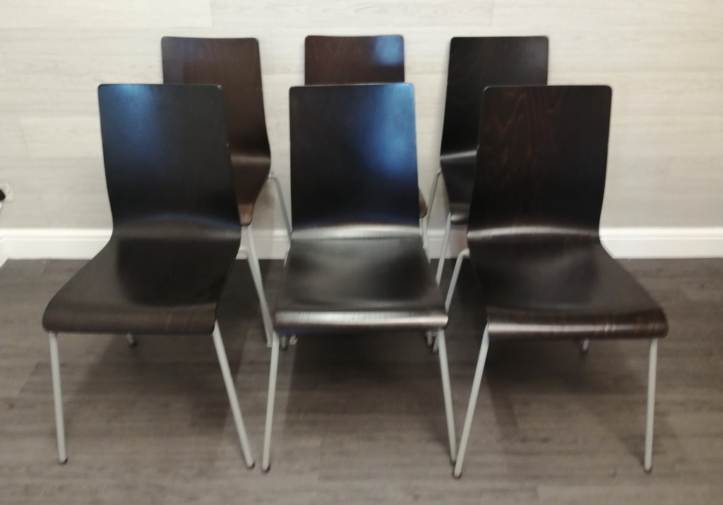 set of six modern stacking dining chairs