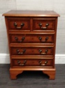 neat yew repro chest of drawers