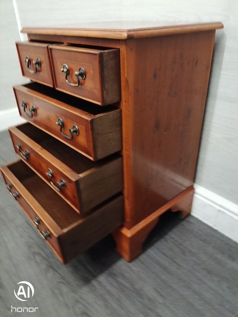 neat yew repro chest of drawers