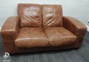 distressed tan leather three seater sofa