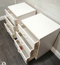 pair of three drawer white bedsides