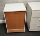 pair of three drawer white bedsides