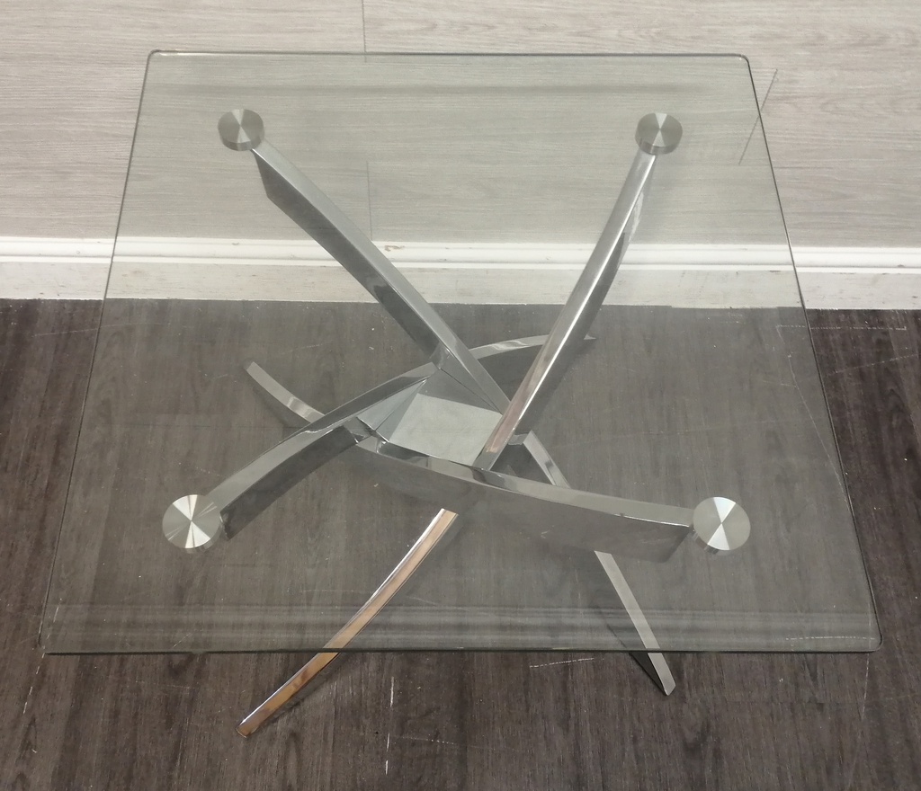 very stylish glass top side table