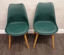 pair of green modern chairs