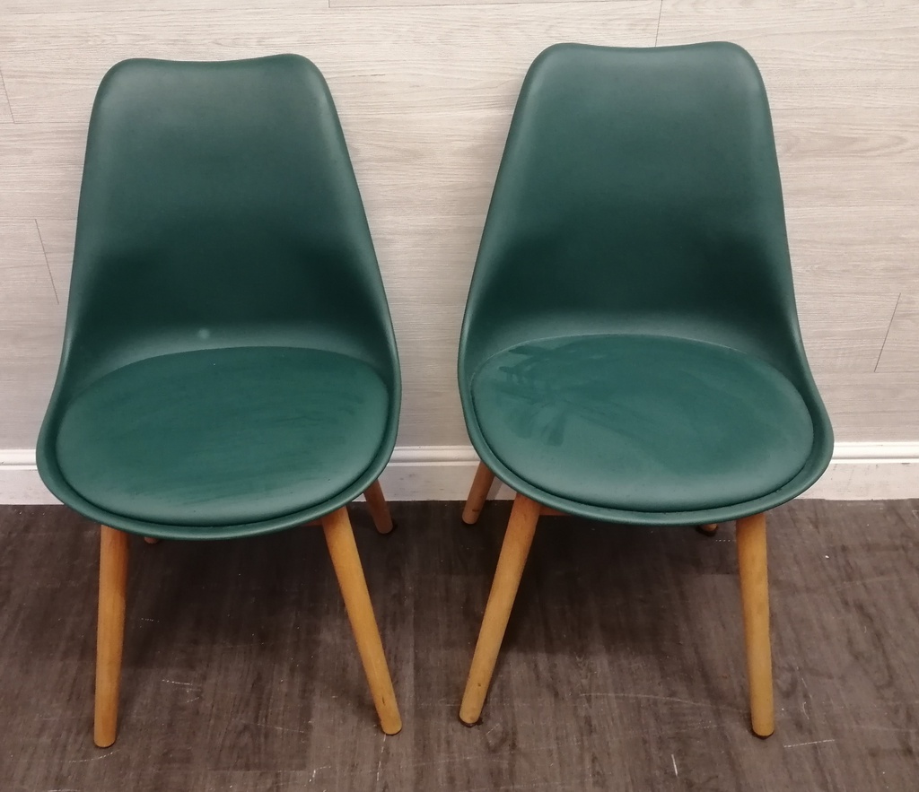 pair of green modern chairs