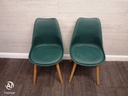 pair of green modern chairs